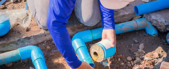 plumber replacing a sewer line
