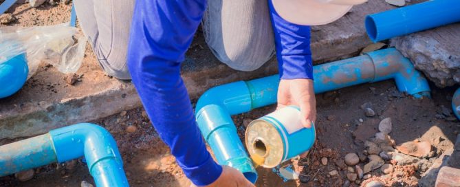 plumber replacing a sewer line
